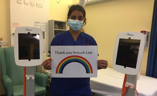 Southampton nurse holding sign to thank Novum Law